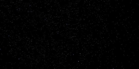 Fototapeta premium Night sky filled with twinkling stars on a dark background, midnight, sparkling, galaxy