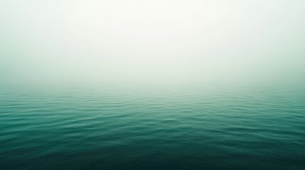 Obraz premium Serene Minimalist View of Calm Water Under Soft Misty Atmosphere