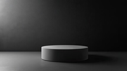 Circular Display Platform on Smooth Dark Surface with Textured Wall