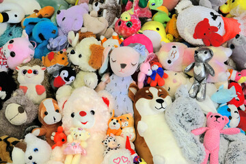 Pile of toys, heap of multicolored stuffed toys. Happy childhood. Happy Birthday. Market place....