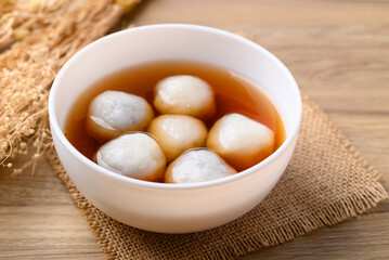 Tangyuan (Chinese sweet dumpling), Glutinous rice flour filling with black sesame in ginger syrup