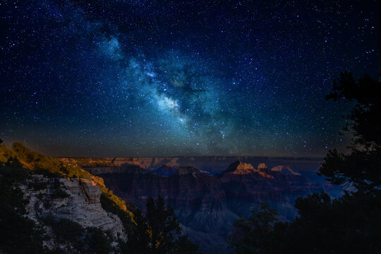 The Milky Way rises over the Grand Canyon, North Rim on a clear moonless night.