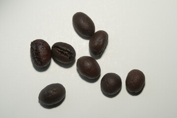Coffee Bean refers to the seed of the coffee plant, which is used to brew coffee, one of the world's most popular beverages.  
