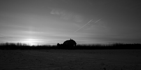 An old barn in a farmers field
