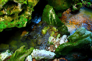 Close-up scenery with the Potenza river near Sentiero Li Vurgacci in Pioraco, transparent waters...