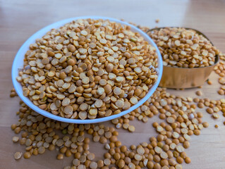 Peas in the white and gold bowl. Close up