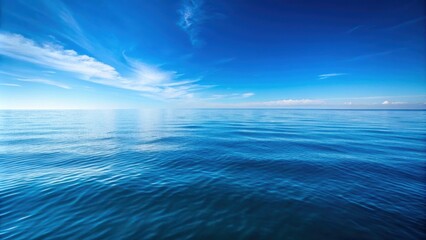 Fototapeta premium A serene blue sea under a clear sky , ocean, water, tranquility, peaceful, nature, beauty, waves, horizon, vacation, travel