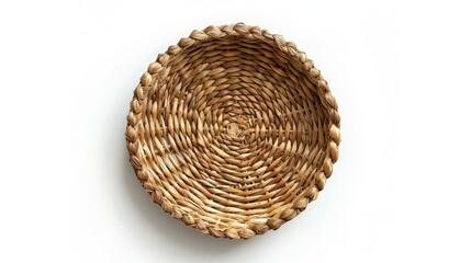 Fototapeta premium A beautiful, natural fiber basket with a warm, earthy tone, isolated on a white background, top view