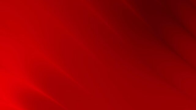 Glossy red abstract gradient motion background with flowing light texture