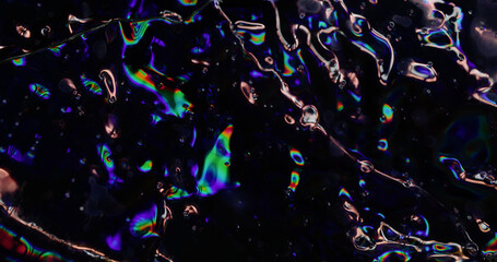 Psychedelic liquid. Blur abstract background. Defocused leak green blue color rays rainbow flickers...