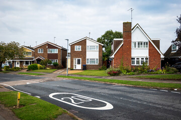 traditional detached house within residential estate in England UK