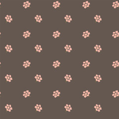 Seamless pattern with small pink flowers on a brown background.