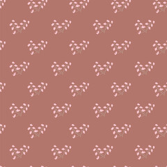 Seamless dainty pink floral pattern on brown background.