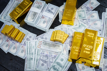 Gold bars and silver bars are placed beside a financial report on a table, symbolizing investment analysis, financial growth,wealth, and prosperity, showcasing the lifestyle of the rich and affluent