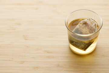 glass of hot tea and tea bag