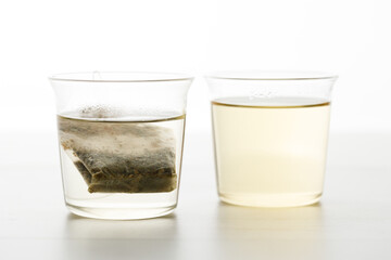 glass of hot tea and tea bag