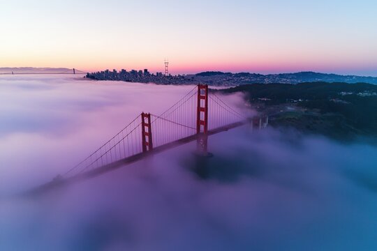 Golden Gate Bridge at Sunrise San Francisco Travel Destination Scenic View Foggy Atmosphere - Powered by Adobe