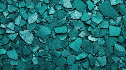 Textured turquoise gravel background with sparkling details.
