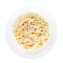 Pasta in creamy sauce with bacon, top view, on a white background, isolated.