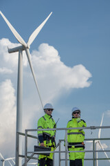 Wind Turbine Maintenance and Repair Technician, Engineer Checking Turbines working maintenance clean power generator system