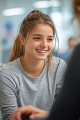 Fototapeta premium Young woman smiles while engaging in conversation in a bright, modern environment with soft lighting. Generative AI