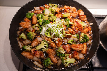 Pork stir fry in black vinegar sauce.