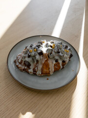 A plate of croissant with glaze.