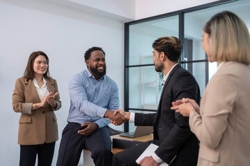 business men doing hands shake for the future business cooperation,multiracial business partnership meeting in the office room