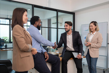 business men doing hands shake for the future business cooperation,multiracial business partnership meeting in the office room