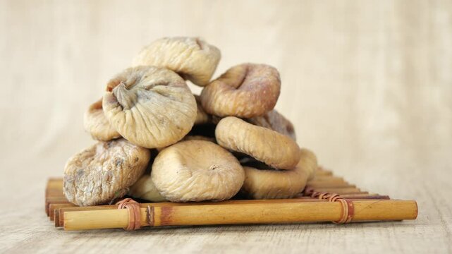 Dried fig fruit on on a plate on table 