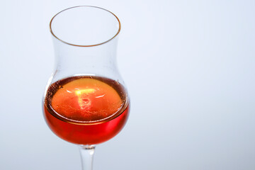 Concept photo of liqueur glass without people with text space