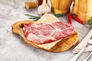 Raw pork neck steak for grill
