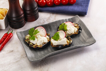 Grilled eggplant with cheese and radish