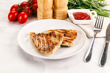 Grilled pork steak with sauce