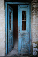 Old wooden door in abandoned house