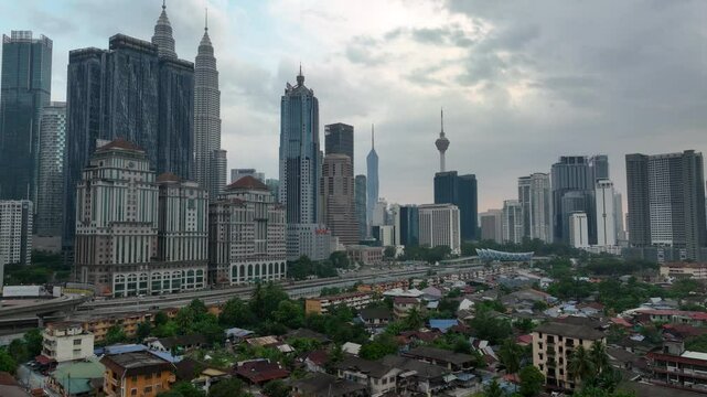 evening time kuala lumpur city downtown residential houses area rooftop aerial panorama 4k malaysia