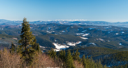 Tatra mountains from Lysa hora hill in Moravskoslezske Beskydy mountains in Czech republic