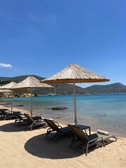 lounge chairs on the beach