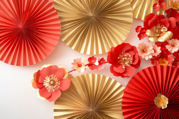 Beautiful red and gold paper fans with flowers create festive atmosphere