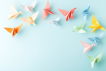 Colorful Origami Birds Flying on a Light Blue Background, symbolizing freedom, art, and creativity, offering an inspiring design with a serene, cheerful atmosphere