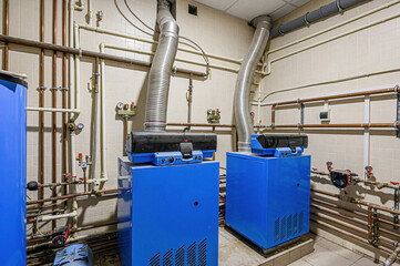 interior apartment room boiler room. heating system, pipes and appliances