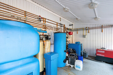 interior apartment room boiler room. heating system, pipes and appliances