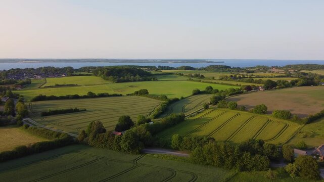 Aerial drone footage of flight over beautiful rural landscape in Angeln at the Baltic Sea in Northern Germany