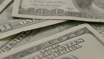 Closeup background of 100 dollar bills old style