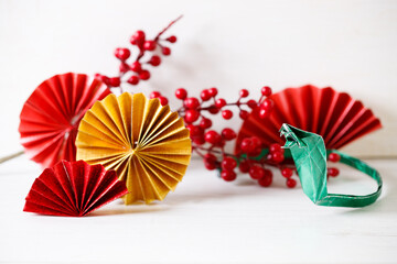 Chinese New Year festival decorations with red Chinese folded fans.