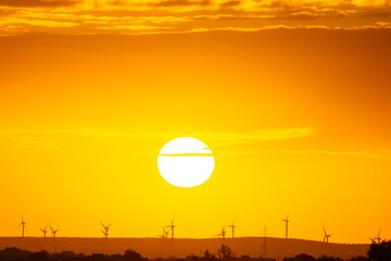 sunset behind the wind turbines in the Essaouira region in Morocco