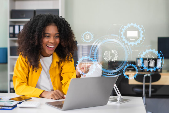 Learning online working concept. Businesswoman working on tablet and laptop computer, searching working in office.