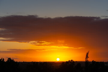 sunset behind the wind turbines in the Essaouira region in Morocco