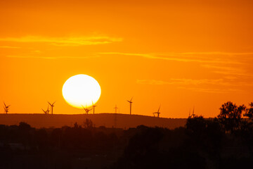 sunset behind the wind turbines in the Essaouira region in Morocco