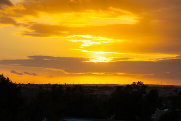 sunset behind the wind turbines in the Essaouira region in Morocco